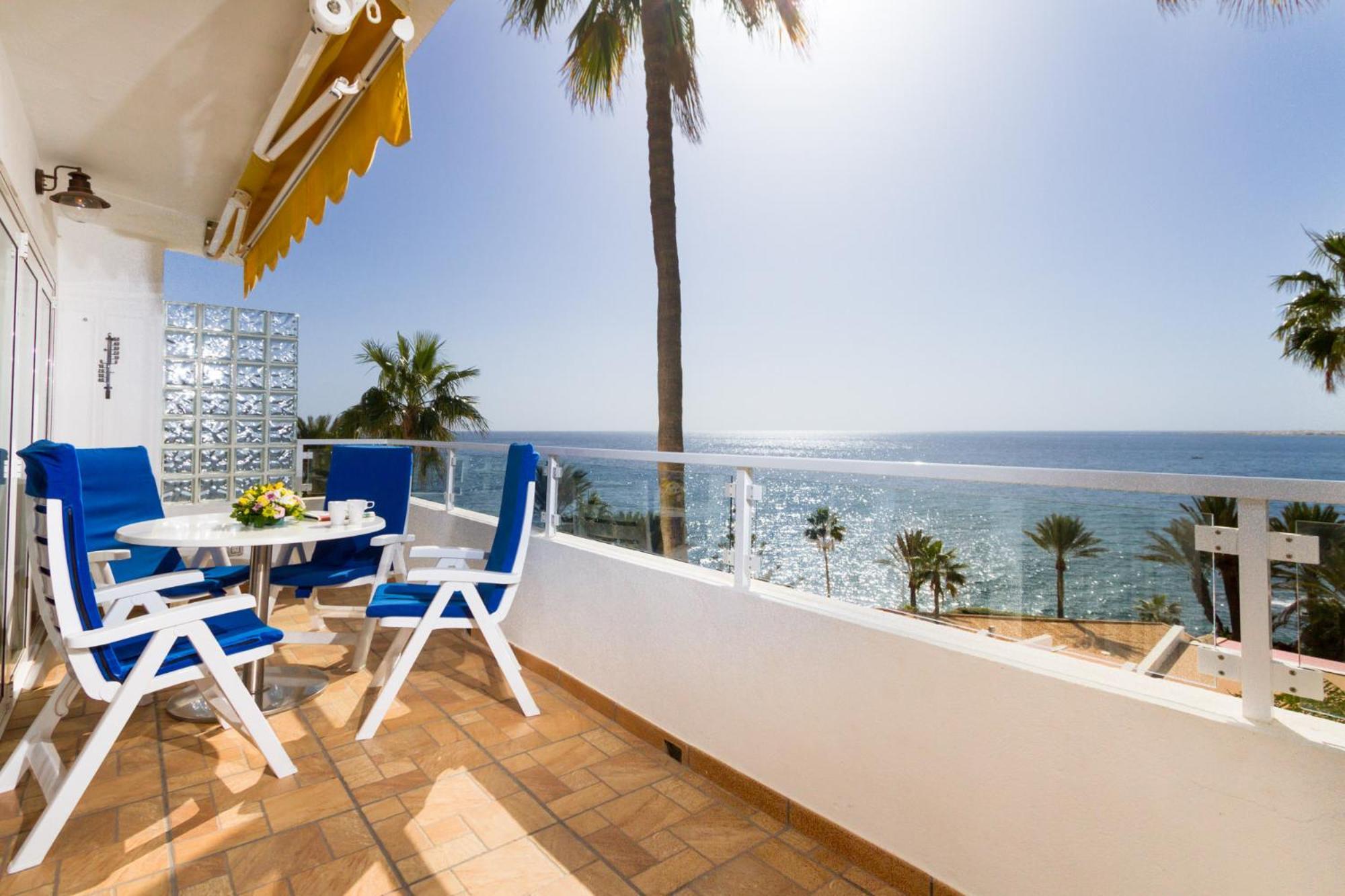Sunsuites Carolina San Agustin  Ruang foto